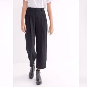 Black pleated wide leg trousers